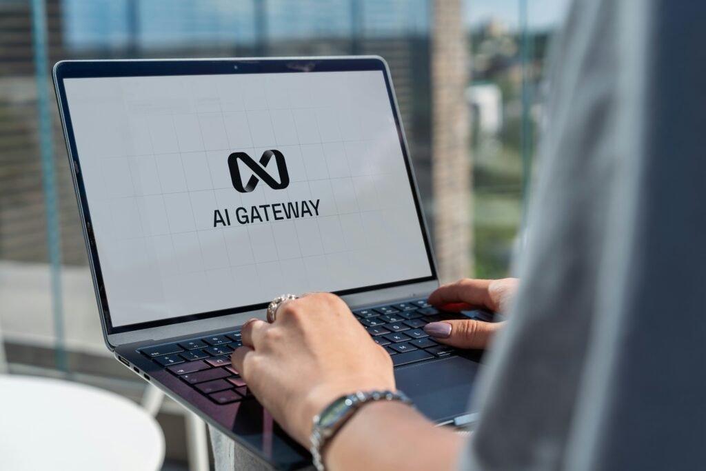 Person using laptop with AI Gateway logo
